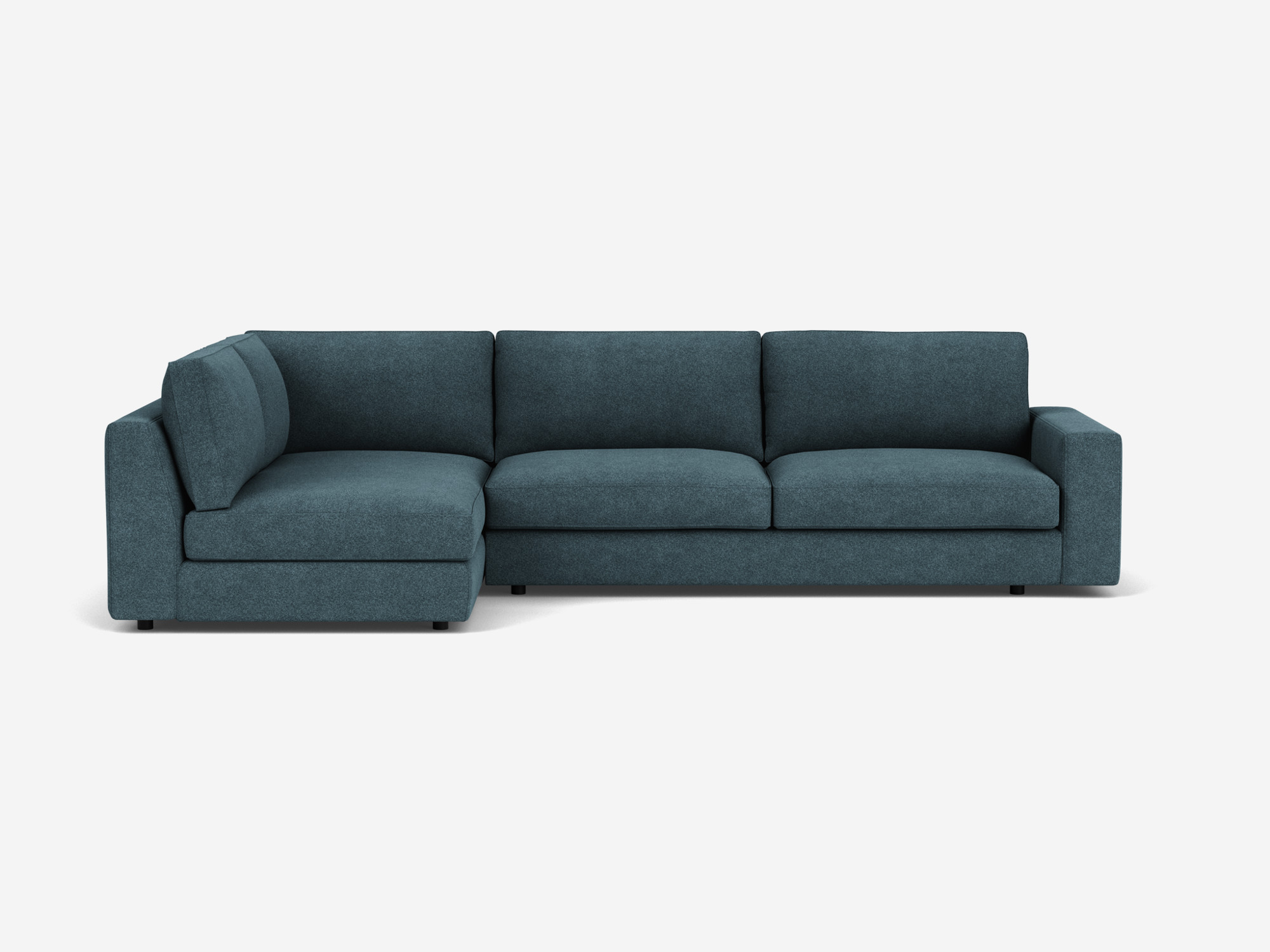 Front view of the Cello modular sofa in blue fabric with left hand chaise